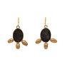 A pair of black oval hook earrings, each with three pendants.